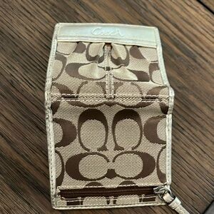 Small Coach gold wallet. Gently used.